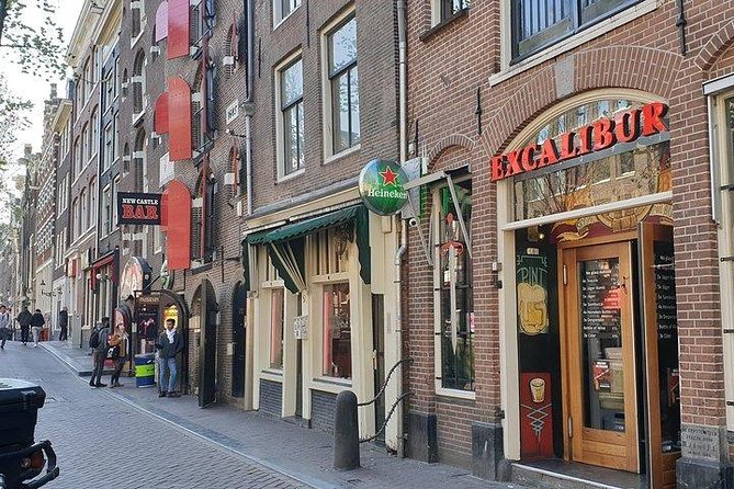 Exclusive small-group Amsterdam Red Light District tour - Smallest House of Amsterdam: VOC Storage to Long-Term Living