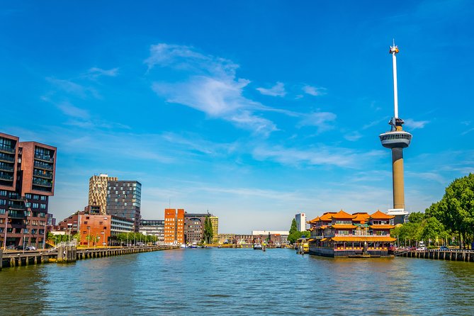 Famous Holland Tour: visit The Hague, Delft, Rotterdam and Kinderdijk from A'dam - Delft’s Canals, Gables, and Towers in 1 Hour 15 Minutes