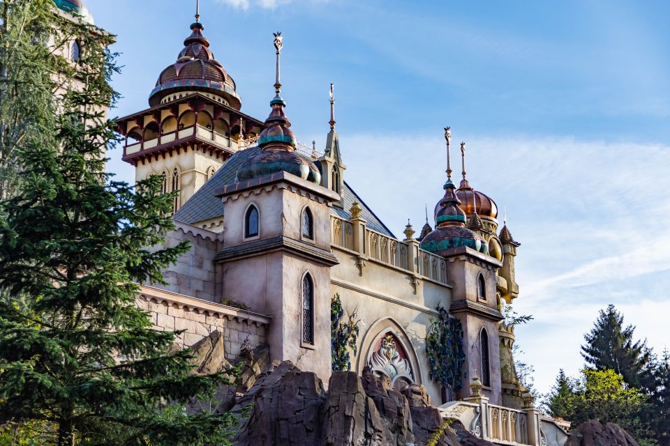 From Amsterdam: Day Trip to Efteling Theme Park with Ticket - Rollercoasters and dark rides: the thrills are built into the story world