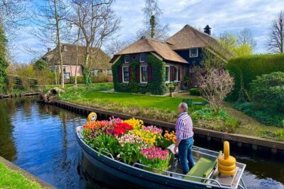 From Amsterdam: Giethoorn Day Trip with Canal & Village Tour - Giethoorn by Boat: The Real Point of the Trip