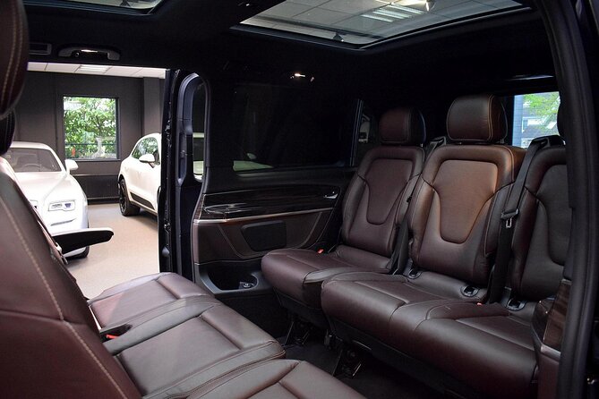 Full-Day Executive Chauffeur Service in Amsterdam - Inside the Car: Quiet Comfort, Wi-Fi, Water, and Real Practical Perks