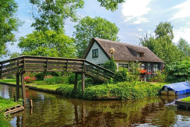 Giethoorn Day Trip from Amsterdam With Cruise and Cheeseplatter - Optional Amsterdam Canal Cruise: Open Departure Voucher with Classic Sights