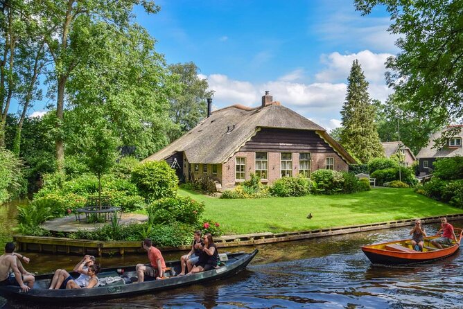 Giethoorn Day Trip from Amsterdam With Cruise and Cheeseplatter - Getting There: De Ruijterkade Pickup, 10:00 Start, and a 7-Hour Rhythm