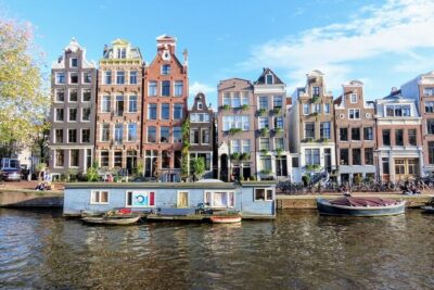 History & culture tour in Amsterdam with a local - Dam Square and the Royal Palace: Power, Ceremony, and WWII Memory