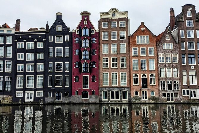History & culture tour in Amsterdam with a local - Nieuwmarkt: Waag, Guilds, and the Story Behind the “Dancing Houses”