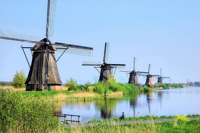 Kinderdijk Windmills and Delft Small-Group Tour from Amsterdam - The Boat Cruise: Getting the Best Angles Without Fighting Lines