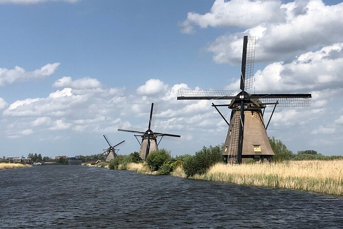 Kinderdijk Windmills, Delft City & Delft Blue Factory Visit - Delft’s historic streets: canals, churches, and Dutch name drops