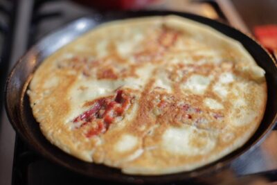 Learn to Make Dutch Pancakes in a Beautiful Amsterdam Canal House - The Dutch tasting table: cheese, applesyrop, and soused-style herring