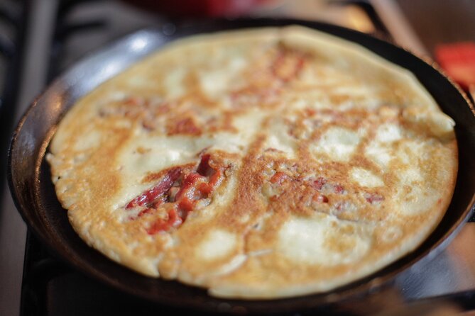 Learn to Make Dutch Pancakes in a Beautiful Amsterdam Canal House - The Dutch tasting table: cheese, applesyrop, and soused-style herring