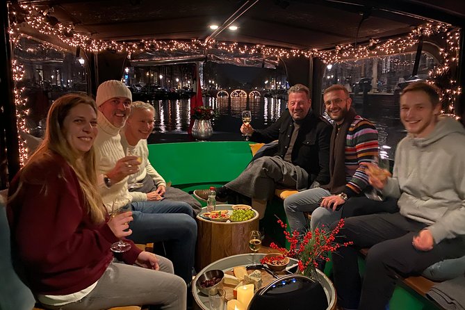 Light Event Amsterdam by small boat, 8 passengers max! You won't find any better - Stop-by-stop: how the ride unfolds