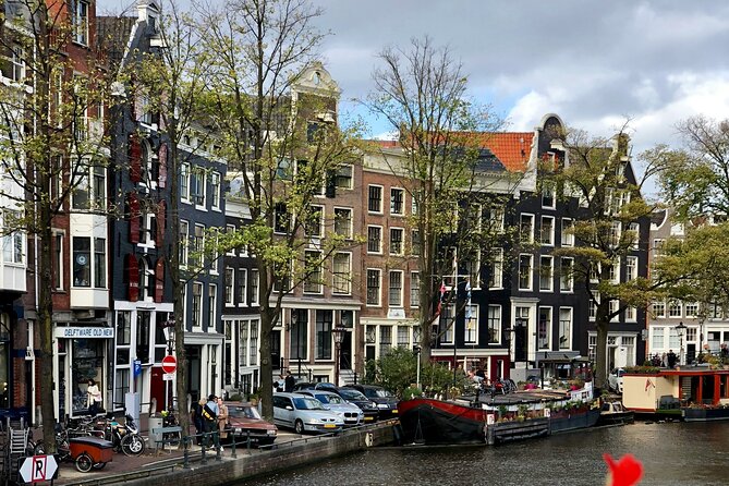 Personalized Hidden Gems of Amsterdam Private Tour with a Local - St. Nicholas Basilica, Dancing Houses, and the Beguines Lesson