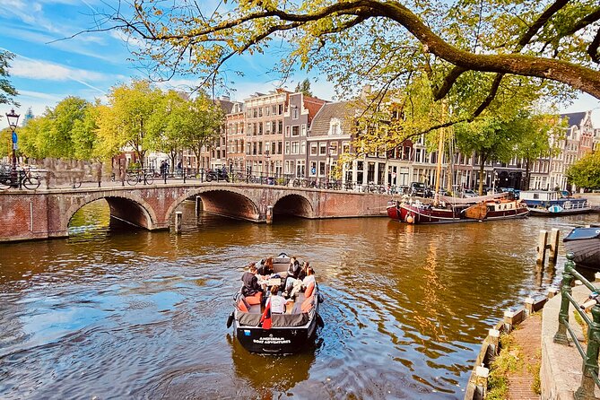 Private 90 Minute Amsterdam Canal Belt Exploration Cruise - Getting onboard: open-boat comfort and what it means for you