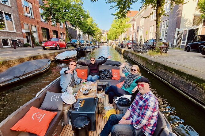 Private 90 Minute Amsterdam Canal Belt Exploration Cruise - Seven Bridges canal from the water: the best vantage point is here