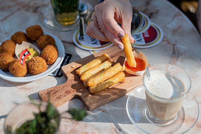 Private Amsterdam Red Light District and Food Tour (TOP RATED) - The Condoms, the Smallest House, and Pub The Ape Stops
