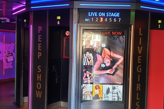 Private Amsterdam Red Light District tour including sex museum - Stop One: The Red Light District walk that stays grounded in context