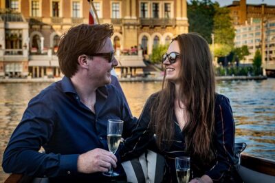 Private Boat Tour Amsterdam - 90 Min incl. welcome drink on historic saloon boat - Welcome Drink, Bottled Water, and Coffee or Tea: The Included Comforts