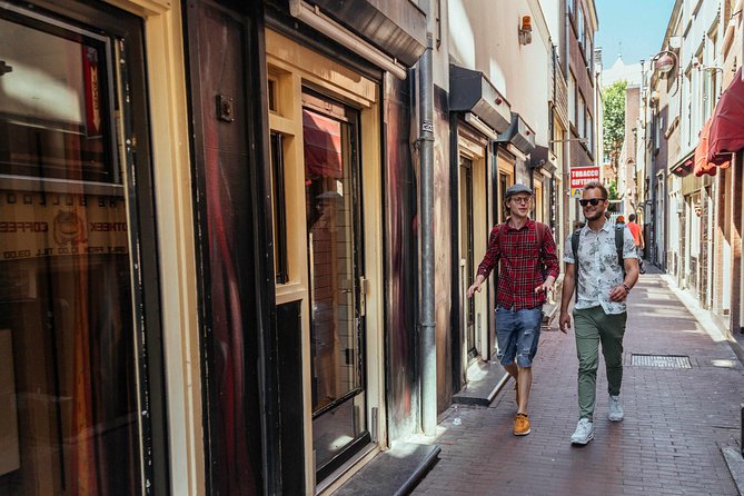 Private City Kickstart Tour: Amsterdam - Chinatown, St. Nicholas Church, and the architecture that doesn’t wait for you