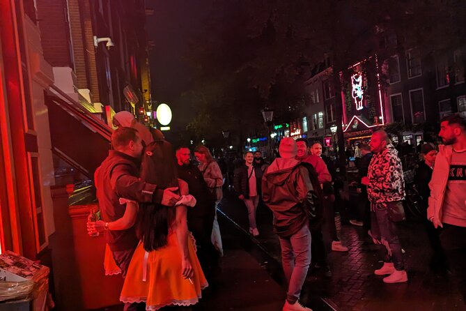 Private Hostess Bar Tour in Amsterdam Red Light District (3h) - Drink n Sink at the end: why this meeting spot matters