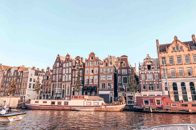 Private Romantic Canal Cruise Amsterdam with Bubbly and Snacks - Medieval tower story and photo-friendly guiding with captains like Valentijn Dirk