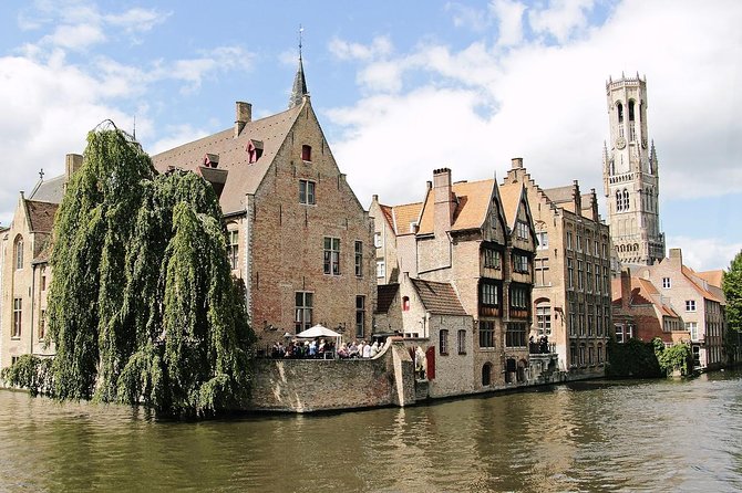 Private Sightseeing Day Trip to Ghent and Bruges from Amsterdam - Gravensteen Castle audio tour: Wouter Deprez and medieval comedy