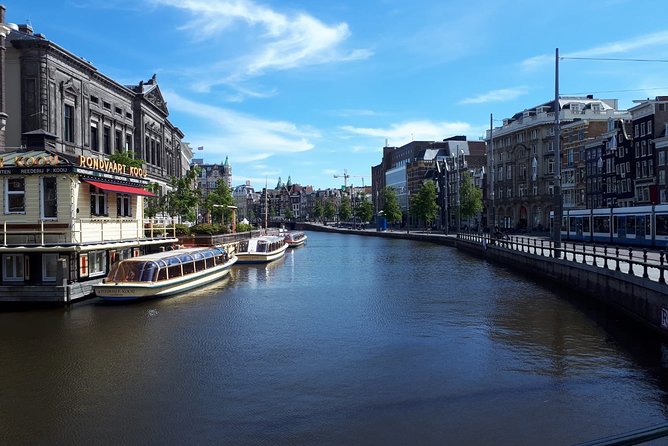 Private Tour: Amsterdam City Walking Tour and Canal Cruise - Dam Square to the Royal Palace zone: the big landmarks, explained