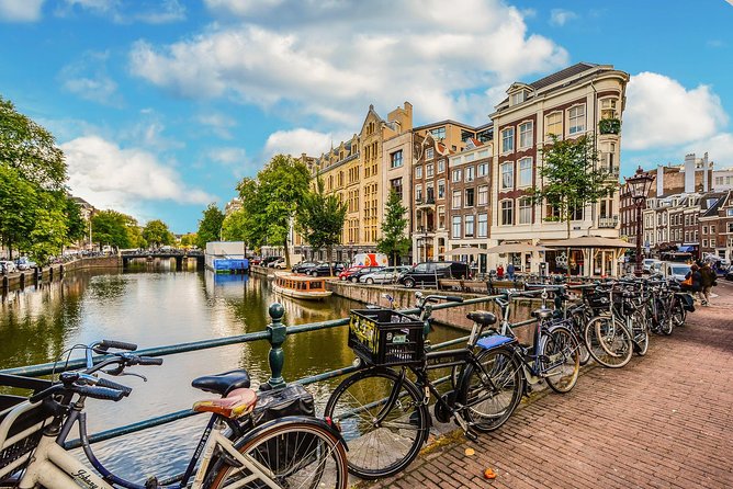 Private Tour: Amsterdam City Walking Tour and Canal Cruise - The tram into the center: a smooth start instead of a maze