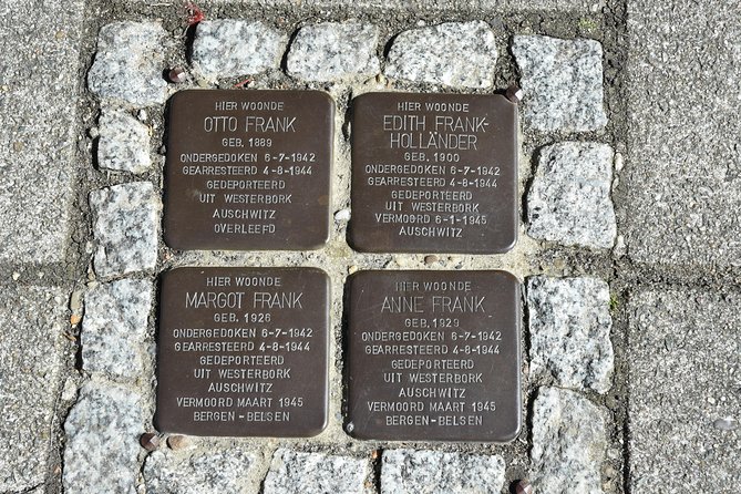 Private Tour: Anne Frank Walking Tour of Amsterdam - Walking past Anne Frank’s school site and the diary excerpt on the walls