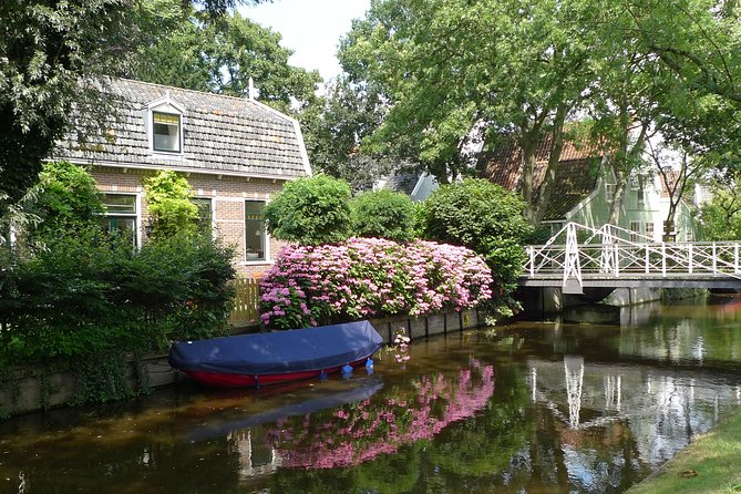 Private Tour Zaanse Schans Windmills and Volendam in Jaguar - Zaanse Schans in 3 hours: windmills, cheese, clogs, and bridges