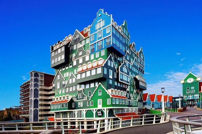 Private Zaanse Schans & Volendam Tour: Windmills, Cheese & Clogs - Volendam harbor time: seafood, shops, and Dutch sweets