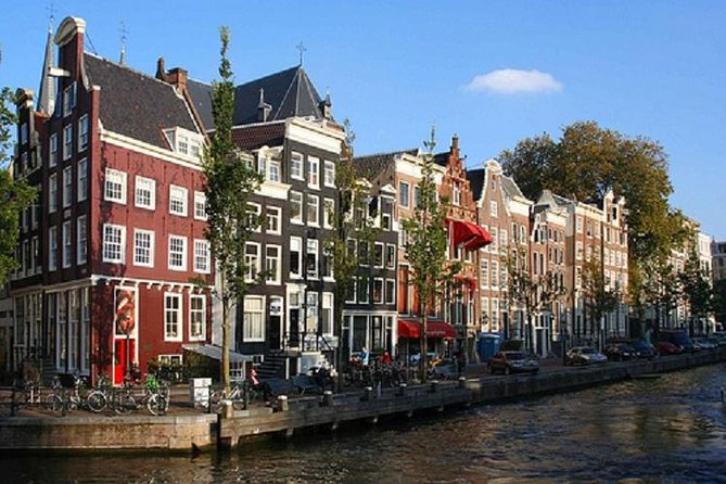 Secrets of Amsterdam Walking Tour plus Dutch Sweets Tasting - Begijnhof: a quiet courtyard break inside the city