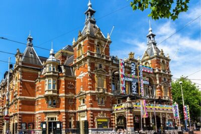 Self-guided city walking tour in Amsterdam - SmartWalk Setup: WhatsApp Link, Mobile Ticket, and Tech Reality