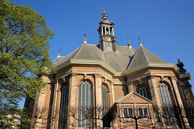 Skip-the-line Royal Palace of Amsterdam Private Guided Tour - Dam Square Views, Nieuwe Kerk Facade, and the National Monument Stop