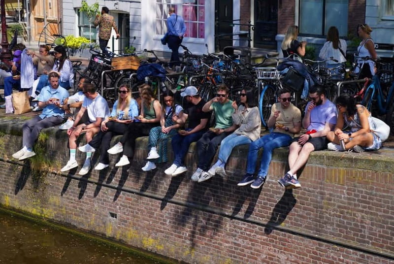 Skipping Lines & Sipping Beers: A History Tour of Amsterdam - History Walk Through Canals and Hidden Streets (Not Just Facts)