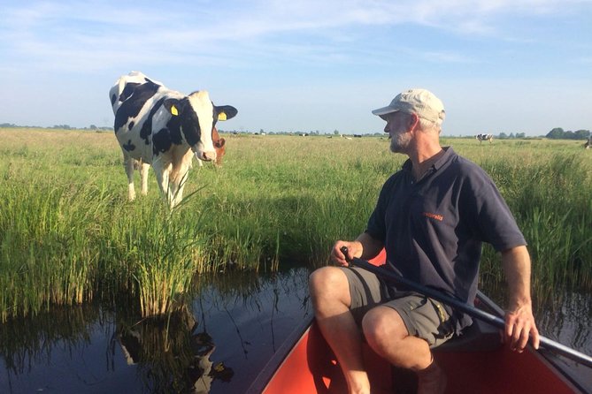 Small-Group Guided Sunset Canoe Tour in Waterland with Dinner - Majel’s welcome: part tour briefing, part village introduction