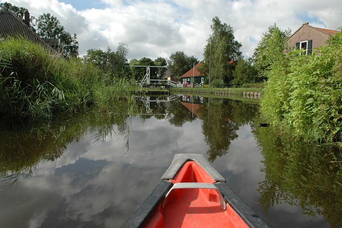 Small-Group Guided Sunset Canoe Tour in Waterland with Dinner - Canoe time through reed beds and polders