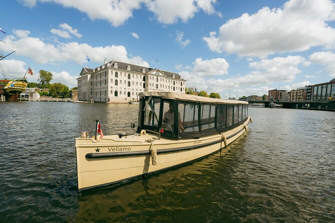 Small-Group Luxury Canal Cruise with Local Skipper - Crooked canal houses near the Amstel: a softer, older Amsterdam vibe