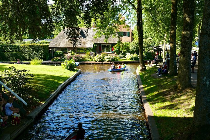 Small-Group Tour to Windmills & Giethoorn with boat tour - Stop 1: Zaanse Schans windmills, museums, wooden shoes, and cheese