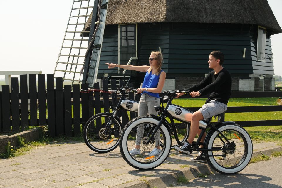 Volendam: E-Fatbike Rental - Marken: canals, bridges, wooden facades, and the long dike approach