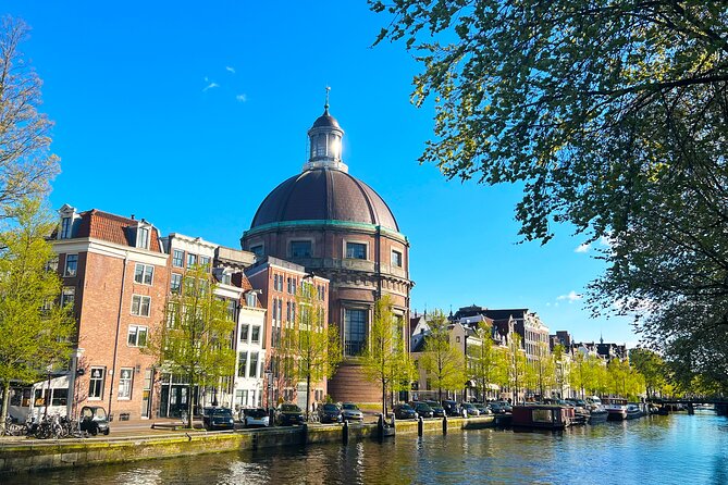 Walking Tour about Golden Age Architecture, private local guide - Dam Square to the Royal Palace: power, planning, and building on tough ground