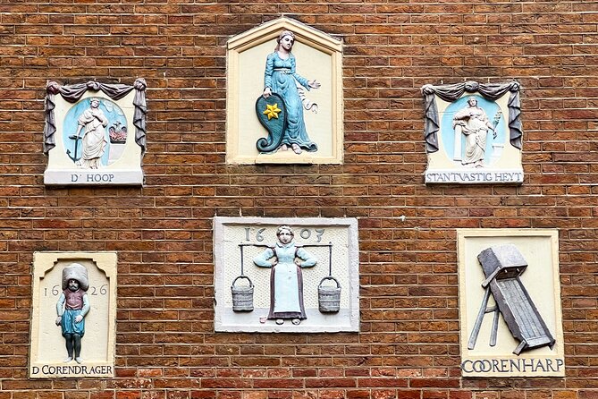Walking Tour about Golden Age Architecture, private local guide - Jordaan’s gevelstenen (facade stones): the tiny plaques that explain the city