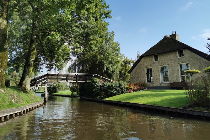 Zaanse Schans and Giethoorn Unique Day Trip with Boat Cruise - Giethoorn lunch and the one-hour boat cruise from the canals